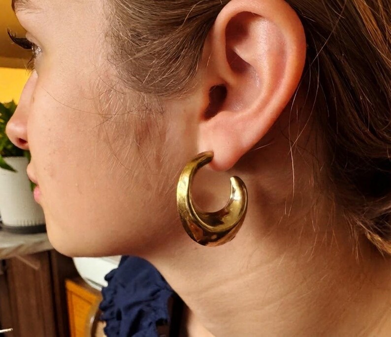 These vintage HALF HOOP EARRiNGS are FABULOUS!  They're gold vermeil over sterling.  The shape is a half hoop or crescent.  They're carinated and puffy or 3-d.  They're lightweight and wear beautifully.  I've left the original patina or tarnish.