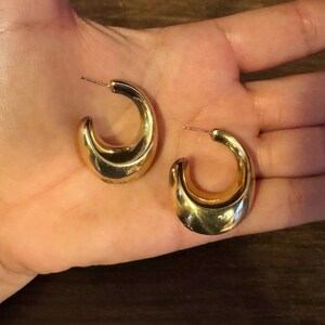 These vintage HALF HOOP EARRiNGS are FABULOUS!  They're gold vermeil over sterling.  The shape is a half hoop or crescent.  They're carinated and puffy or 3-d.  They're lightweight and wear beautifully.  I've left the original patina or tarnish.