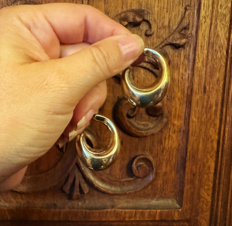 These vintage HALF HOOP EARRiNGS are FABULOUS!  They're gold vermeil over sterling.  The shape is a half hoop or crescent.  They're carinated and puffy or 3-d.  They're lightweight and wear beautifully.  I've left the original patina or tarnish.