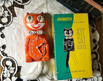 KIT CAT KLOCK, FeLiX the Cat vintage, plastique orange avec cristaux, animé avec des yeux qui bougent, Underwriters Laboratories, fonctionne ! Avec boîte