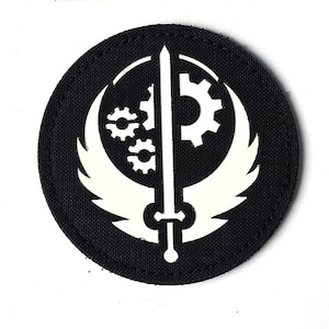 Écusson moral Confrérie de l'Acier - Écusson laser avec crochet