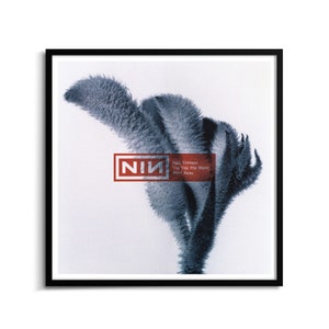 Experience the gripping intensity of Nine Inch Nails with this compelling poster featuring The Day the World Went Away. Crafted on premium paper, this poster captures the raw emotion and depth of the song's essence.