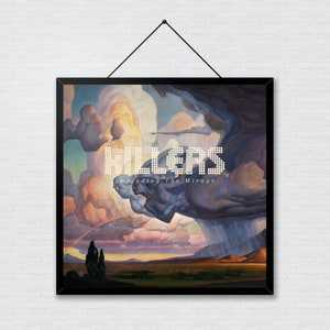 May include: A framed album cover for the band The Killers. The cover features a painting of a large, swirling cloud formation with a rainbow in the background. The band's name, "The Killers", is written in white letters against the cloud, and the album title, "Imploding the Mirage", is written in smaller white letters below the band's name.