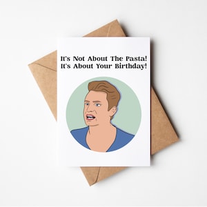 May include: A white card with a cartoon illustration of a man with brown hair and a blue shirt. The text on the card reads "It's Not About The Pasta! It's About Your Birthday!"