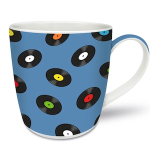 May include: A blue ceramic mug with a white handle and a pattern of black vinyl records with colorful labels.