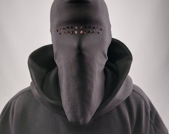 Blank black balaclava made from 100% cotton with raw edges in one size with holes.
