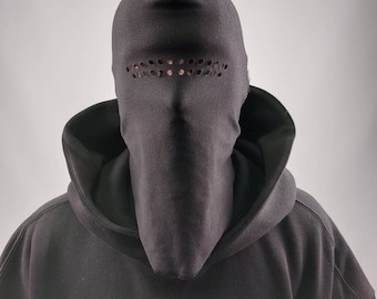 Blank black balaclava made from 100% cotton with raw edges in one size with holes.