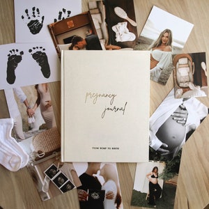 May include: A cream-colored pregnancy journal with gold lettering that reads "pregnancy journal" and "from bump to birth". The journal is surrounded by photos of a pregnant woman, a baby, and ultrasound images.