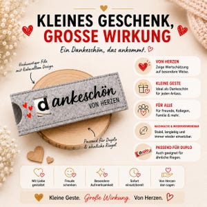 May include: A rectangular grey felt sleeve featuring the black text "dankesch&ouml;n VON HERZEN" and three small red hearts. The sleeve has a cutout window and is designed to hold a chocolate bar. The image includes German text and icons.