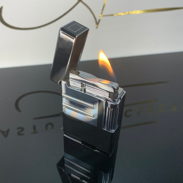 High Class Table Lighter, Refillable Flip Top With Side Grind Flint in Cool Black & Silver, takes Butane gas.