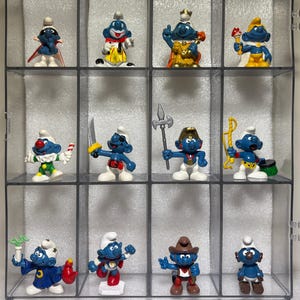 DISGUISED-1204 Uit de collectie generieke smurfen - DISGUISED Smurfs-thema Tweedehands vintage smurfen Peyo Schleich-beeldje Schtroumpf