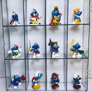 DISGUISED-1202 Uit de collectie generieke smurfen - DISGUISED Smurfs-thema Tweedehands vintage smurfen Peyo Schleich-beeldje Schtroumpf