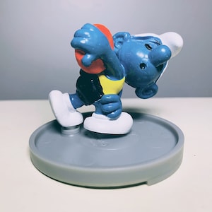4.0503-02_Super Smurf Collection- Nice Vintage Pre-owned Peyo Schleich Smurf Figure 40503 Discus Thrower Smurfs Super Schtroumpf figurine