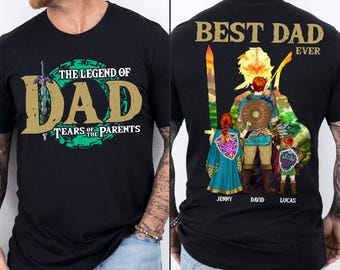 May include: Black t-shirt with a graphic design featuring the text "THE LEGEND OF DAD TEARS OF THE PARENTS" on the front. The back of the shirt says "BEST DAD EVER" with a family illustration and names.