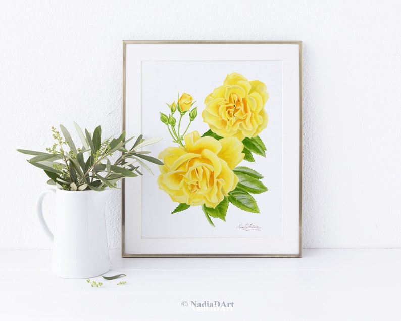May include: Watercolor painting of yellow roses with green leaves and stems. The roses are in full bloom and have a delicate, feminine appearance. The painting is framed in a simple gold frame.