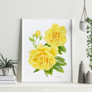 May include: A watercolor painting of yellow roses with green leaves. The roses are in full bloom and have a delicate, romantic feel. The painting is framed in a white frame.