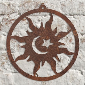 May include: A rusty metal sun and moon wall decoration with a star in the crescent moon. The sun and moon are cut out of a circle of metal.