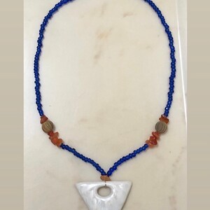Glass Necklace with an Iridescent Glass Pendant, Handmade Wooden Beads, and Peach Aventurine chip beads