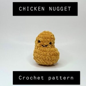 May include: Crocheted chicken nugget plush toy with a smiling face. The toy is brown and has a textured surface. The image text reads "Chicken Nugget Crochet pattern".