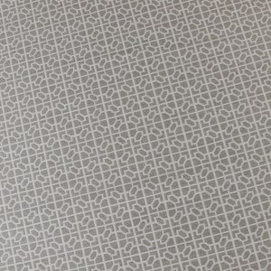 May include: A close-up of a gray textured surface with a repeating geometric pattern.