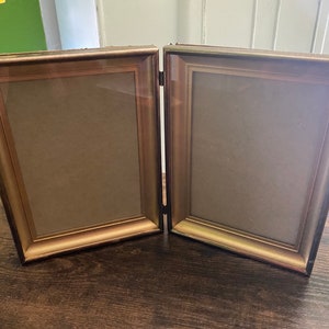 VINTAGE 5&quot;x7&quot; gold metal photo double pic frame hinged for two photos Mid Century bifold table-top retro gold frame-MCM- Hollywood Regency