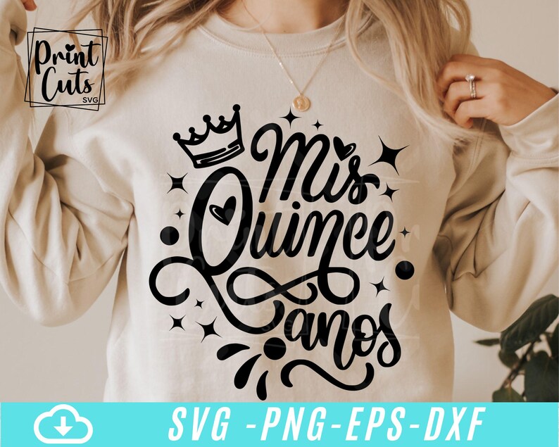 May include: A white sweatshirt with a black design that says "Mis Quince Anos" with a crown and a heart.