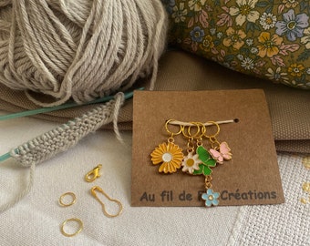 Anillos marcadores de puntadas para tejer o crochet con tema de flores.