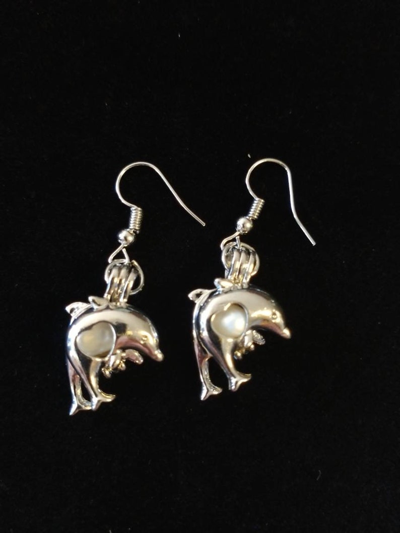 Dolphin Pearl Cages