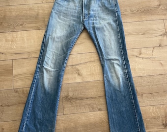 Vintage Y2K Diesel Flared Jeans made in Italy size 26 (tag size W27)