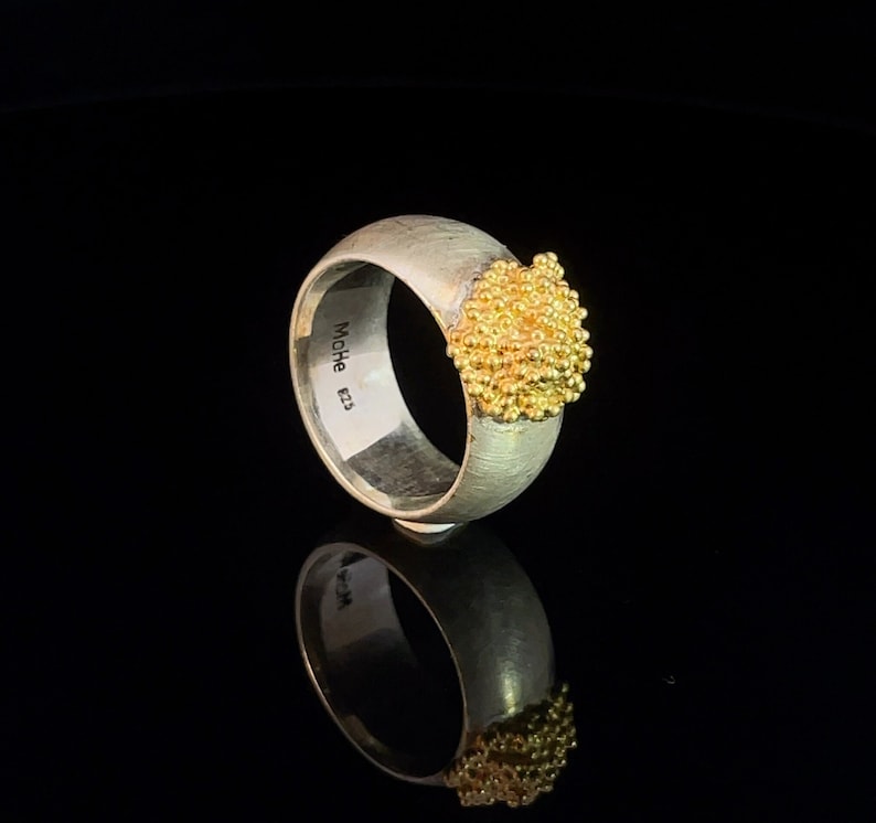 Elegant sterling silver ring with gold-plated accents image 2