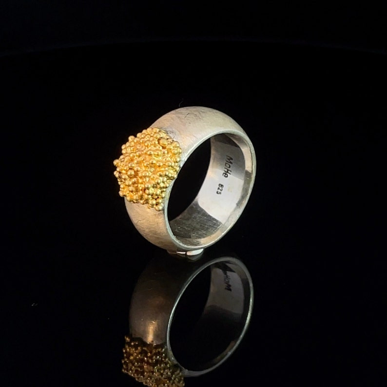 Elegant sterling silver ring with gold-plated accents image 1