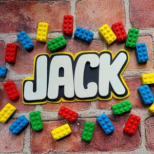 Edible building blocks and custom name cake decorations