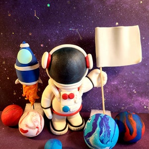 Custom astronaut, rocket & space themed cake toppers