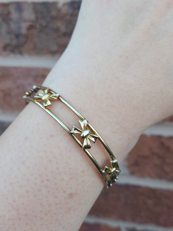 Vintage gold filled slip on bangle with bows all … - image 3