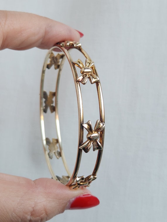 Vintage gold filled slip on bangle with bows all … - image 1