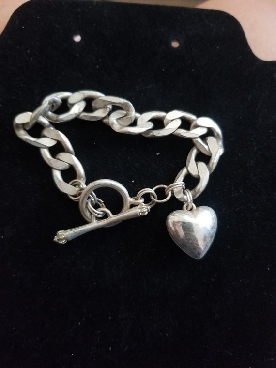 Silver Toned Curb Chain Bracelet With Puffy Heart 