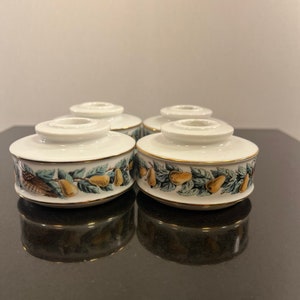 Avon candleholders set of four