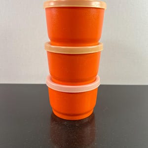 vintage set of 3 small Tupperware containers with lids