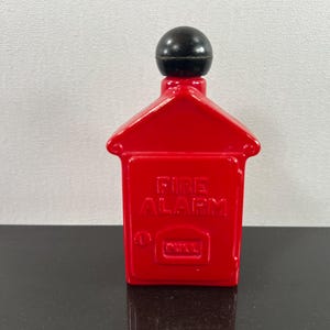 vintage Avon fire alarm perfume bottle