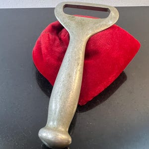 vintage metal bottle opener