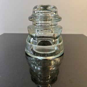 vintage clear glass insulator