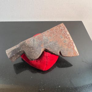 vintage metal hatchet and hammer head