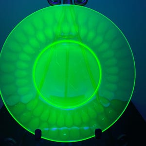 vintage uranium glass thumbprint plate (as is)