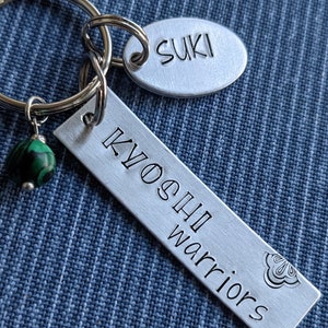 Kyoshi Warriors keychain, Suki charm and green charm, Avatar: The Last Airbender