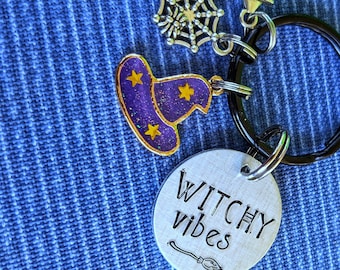 Witchy vibes keychain in American Horror Story font with 3 different charms