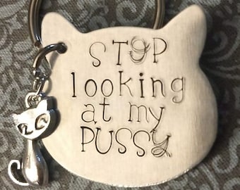 Hand-stamped aluminum cat-shaped keychain