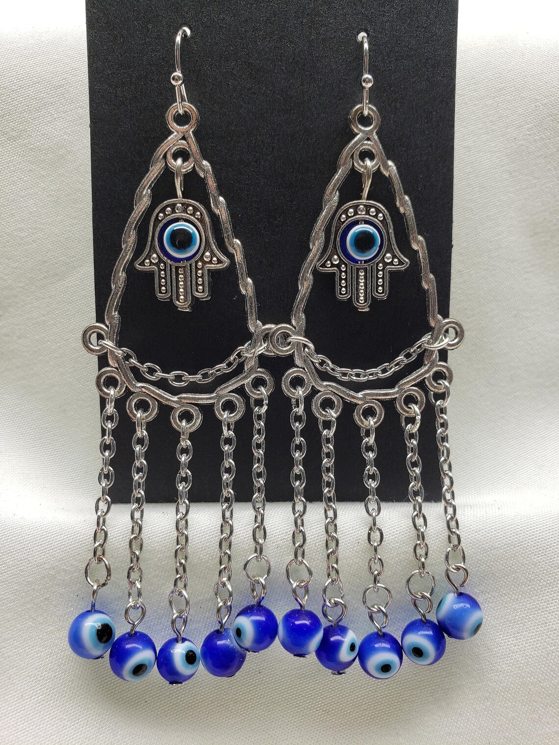 Evil earrings Clearance