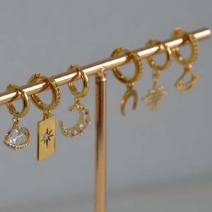 Mix and Match gold earrings with zirconia stones