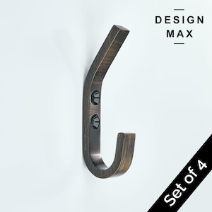 May include: Set of four antique bronze hooks. Each hook is made of metal and has a simple, curved design. The hooks are attached to a white wall. The text "Set of 4" is visible in the lower right corner of the image.