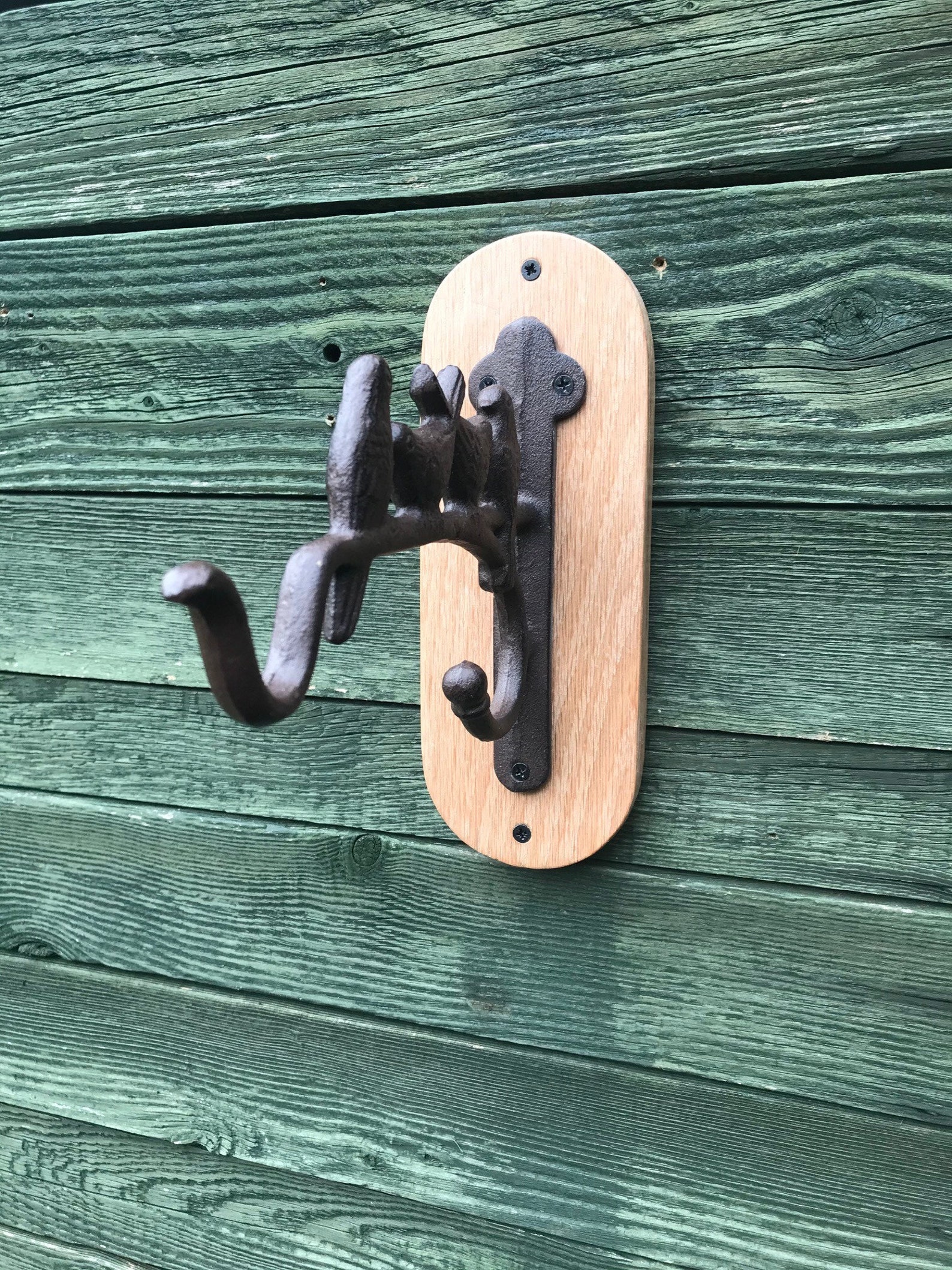 Cast iron hanging basket bracket with birds mounted on a Etsy